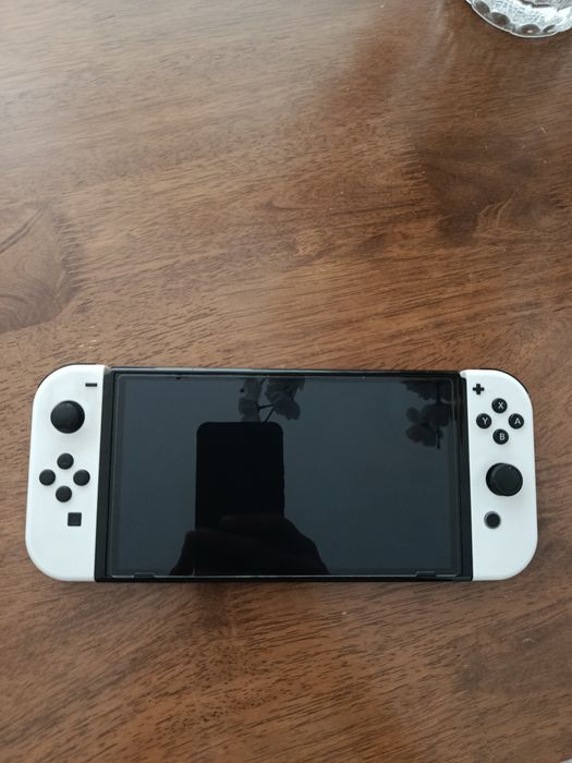 nitendo switch oled so aceito dinheiro em maos