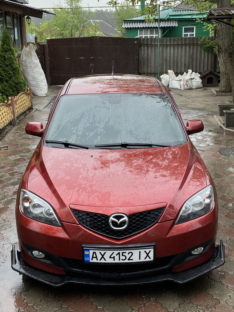 Mazda 3.        .