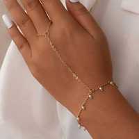 Złota bransoletka boho z pierścionkiem na łańcuszku białe koraliki