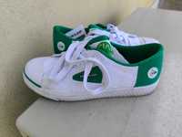 Ténis Dunlop verdes e brancos
