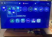 PS4 com 2 comandos + TV – 250€