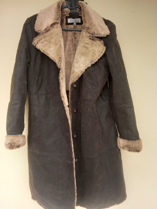 Genuine leather vintage coat with faux fur