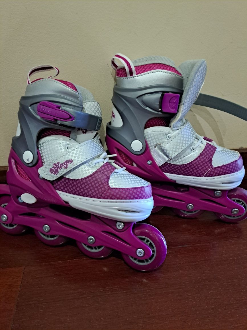 Patins em linha infantil rosa