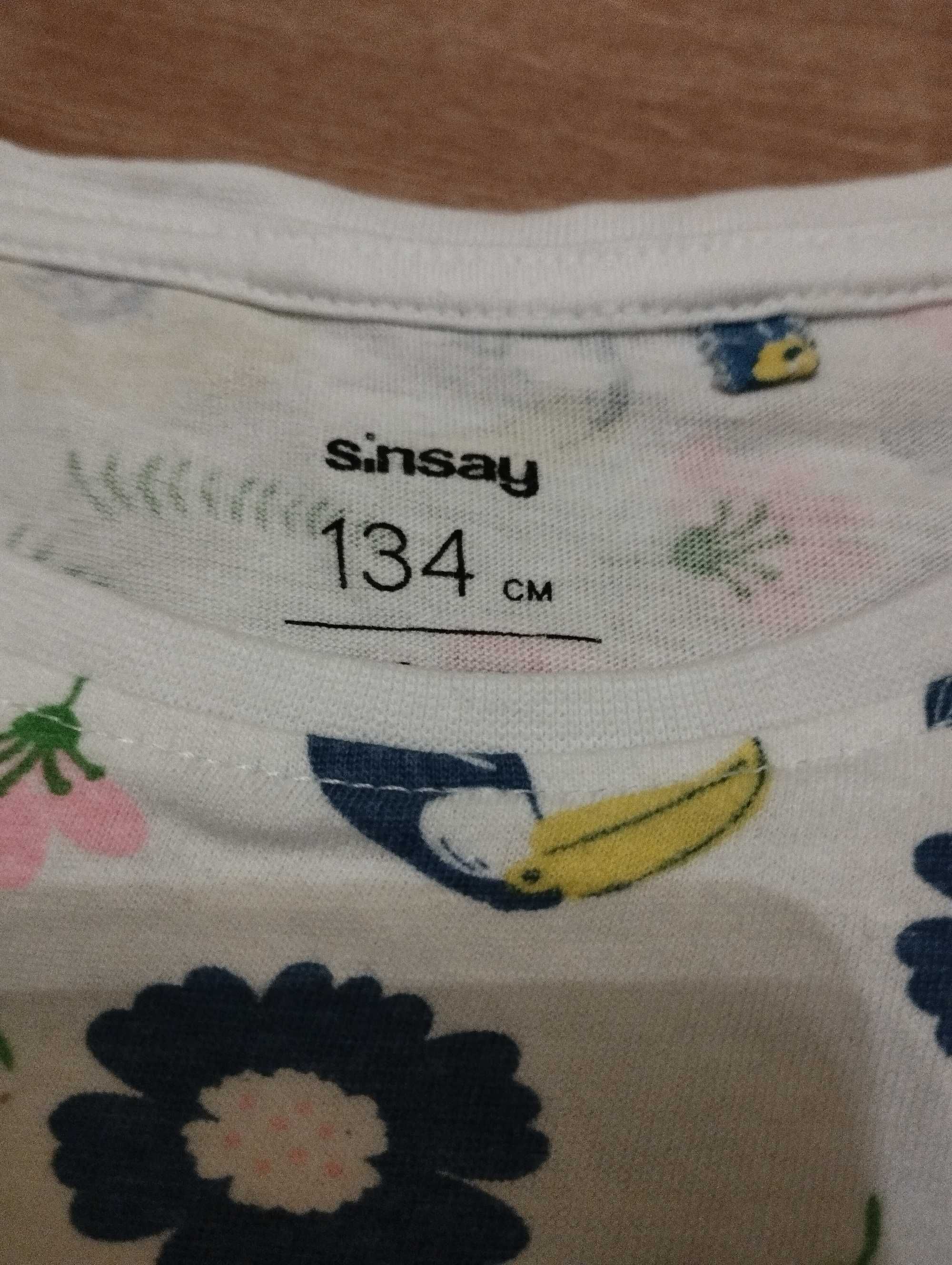 Tunika z krótkim rękawem w rozmiarze 134.