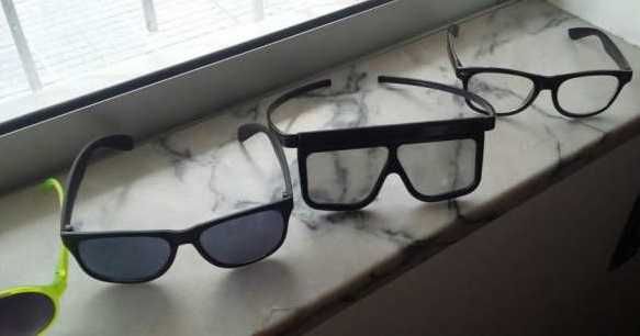 óculos de sol de diversas marcas
