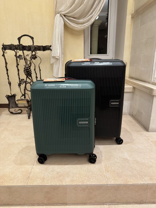 American tourister мала та снредня нові валізи