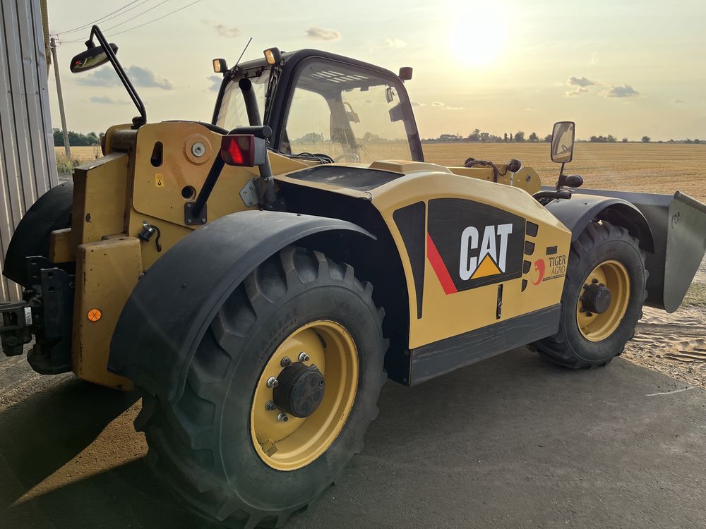 Телескопічний навантажувач JCB Manitou CAT TH 406 manitou