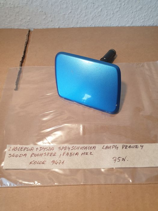 zaślepka + dysza spryskiwacza lampy prawej skoda roomster ,fabia mk2