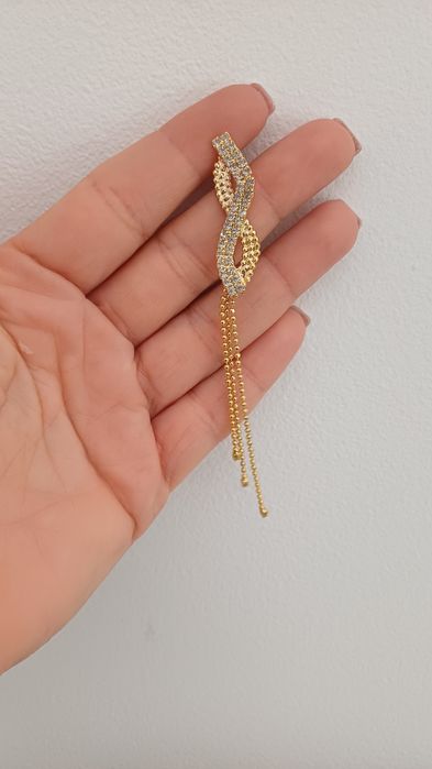 Brincos dourados com pormenor prateado