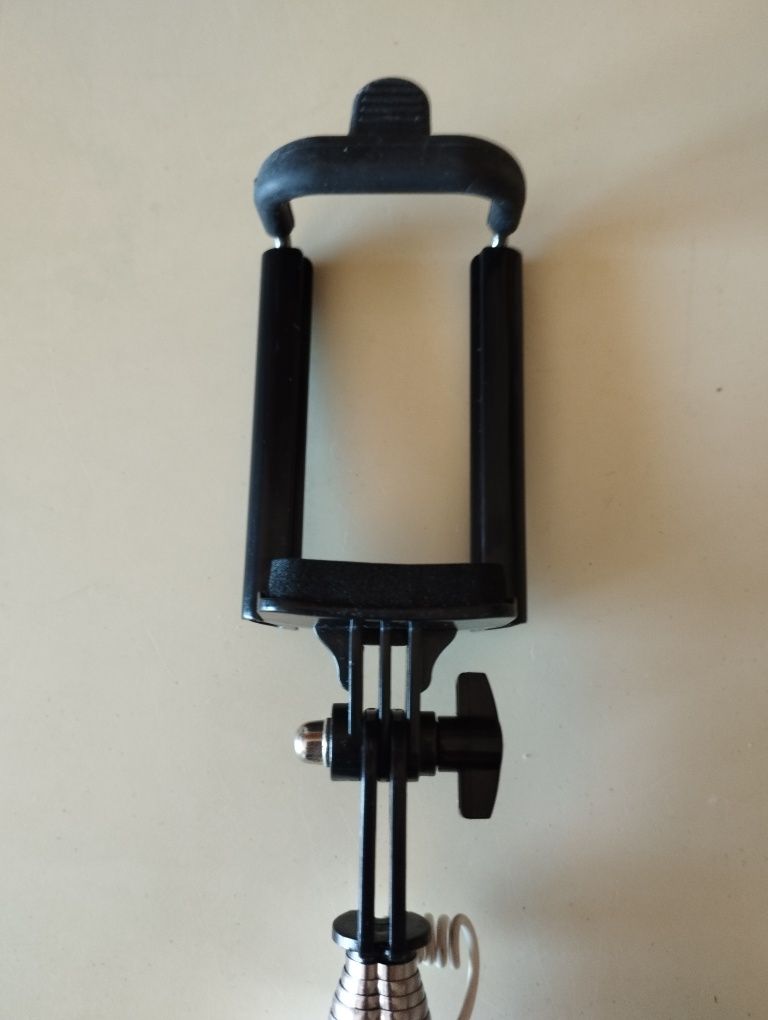 Adaptador para telemóvel telescópio