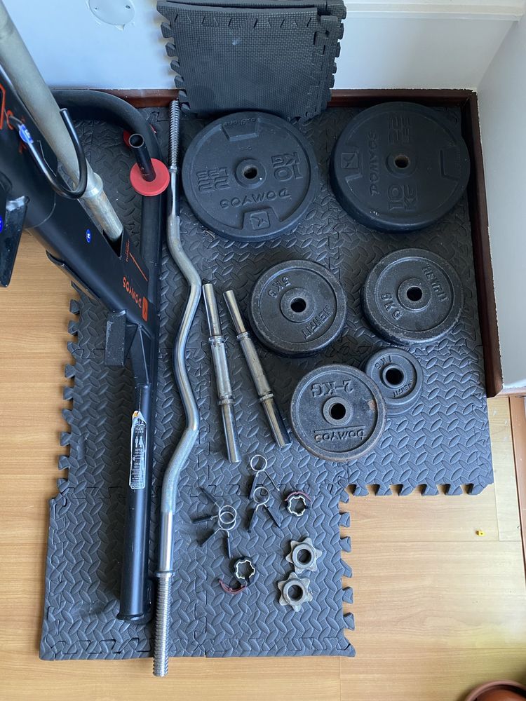 Rack musculacão com barras e pesos