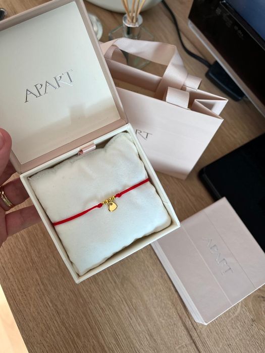 Piękna nowa bransoletka na sznurku, złote serce