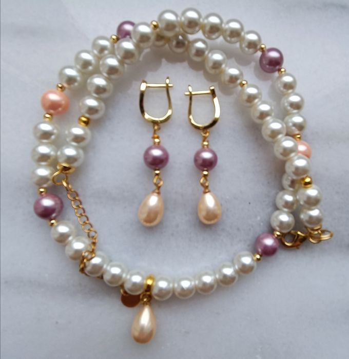 Колье та сережки з перлами