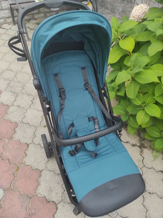 Коляска Carello nova насиченого смарагдового кольору.