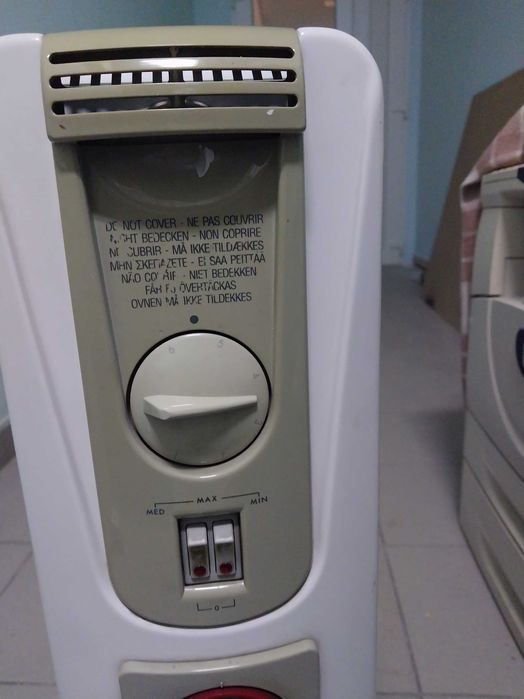 Масляный обогреватель итальянский Delonghi