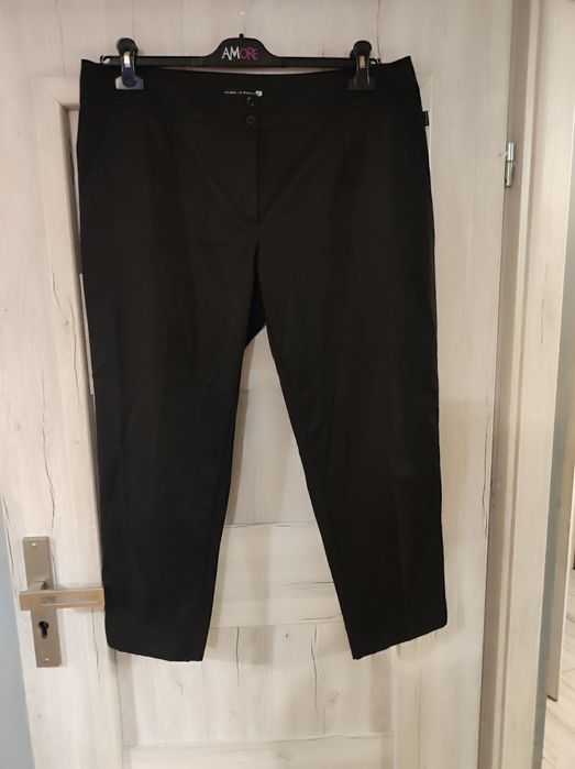Eleganckie spodnie 7/8 polskiego producenta rozmiar 50.