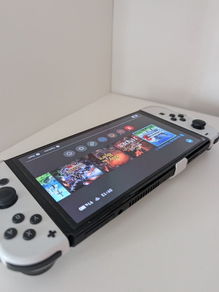 Switch OLED + grip + case