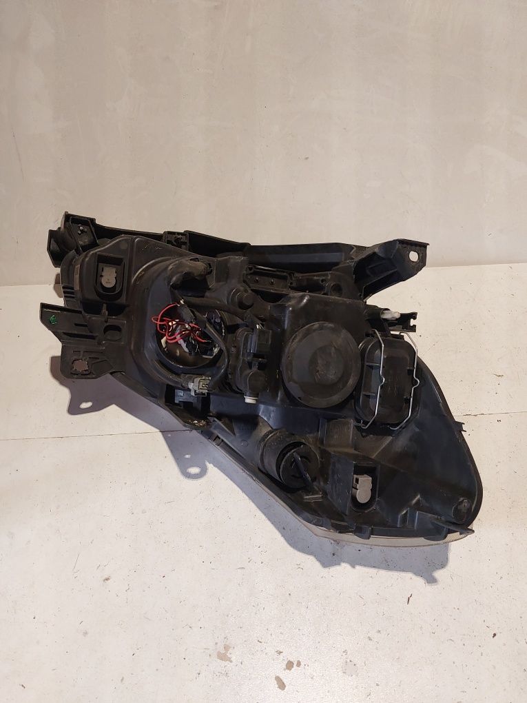 Renault clio III 3 lewa przednia lampa przód reflektor lewy soczewka