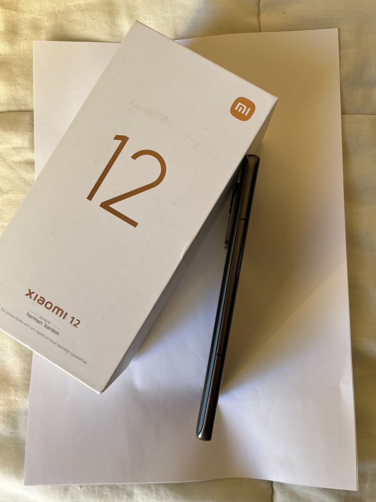 Xiaomi Redmi Note 12 128gb W/ Charger and cell phone cover