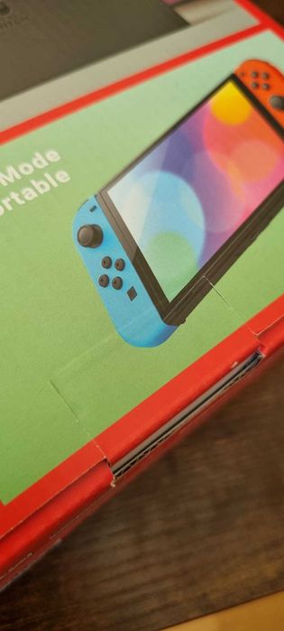 Nintendo Switch OLED + Comando [SELADA]