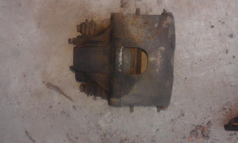 Суппорт тормозной передний Chrysler Grand Voyager/ Dodge Ram Van 2,5Д