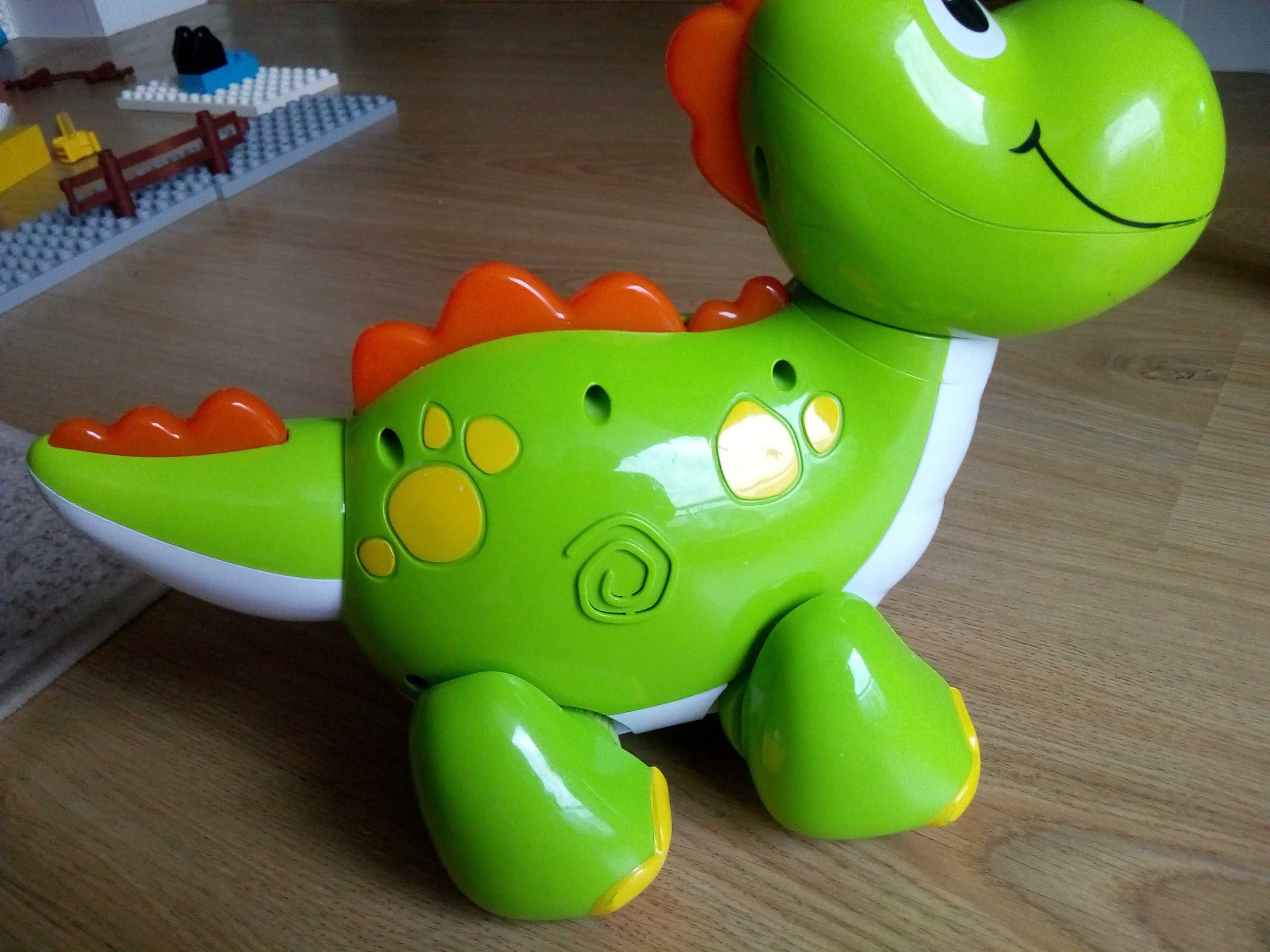Dinozaur zabawka interaktywna grająca na baterie
