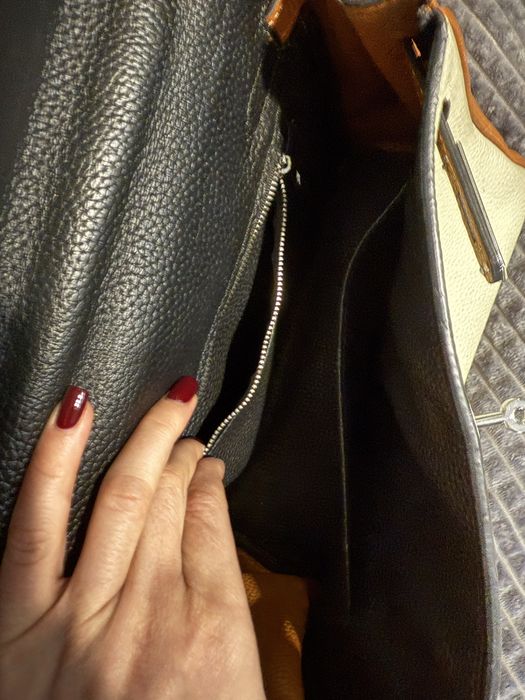 Сумка з натуральної шкіри , є пильник .