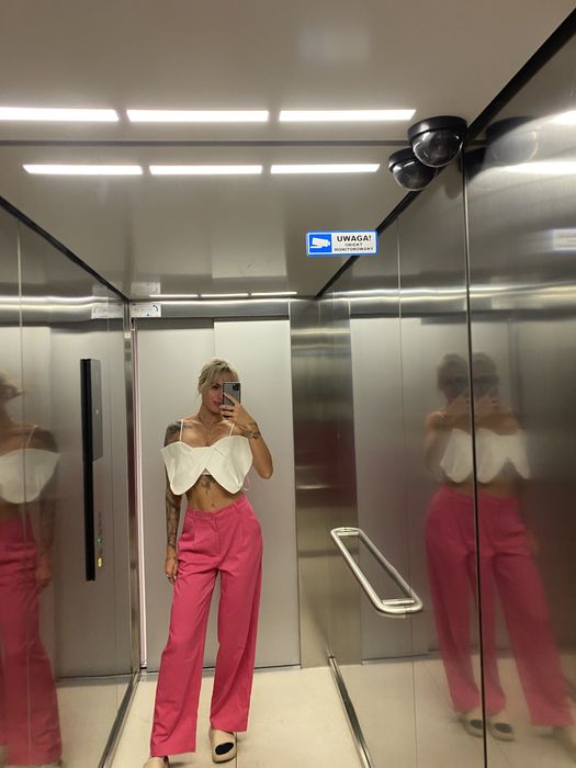 Rozowe eleganckie lub codziennie spodnie