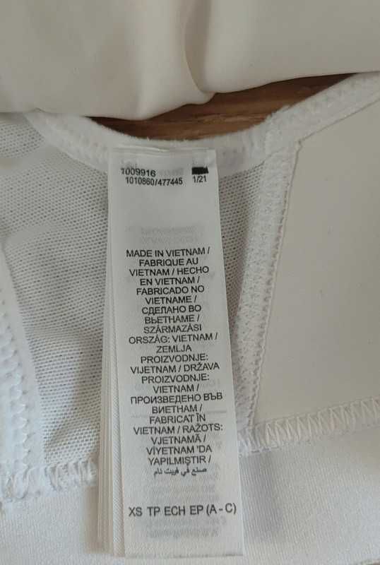 Biały masywny sportowy stanik biustonosz na siłownię Nike rozm XS