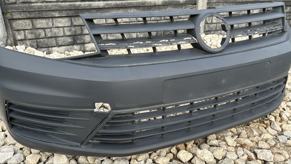Zderzak przedni bez otworów VW Caddy III 2K5 FL lift 15- oryginal