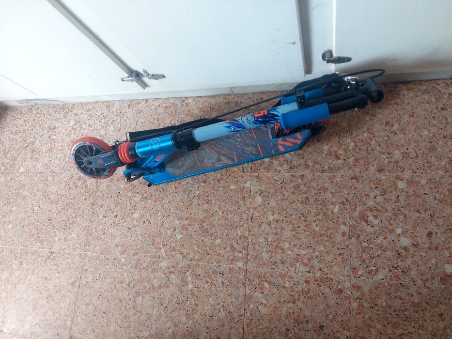 Trotinete  com travao oxelo