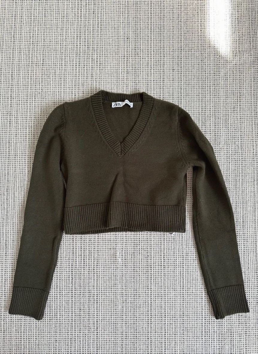 Sweter z ściągaczem na dole