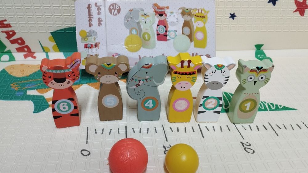 Bowling de animais em madeira