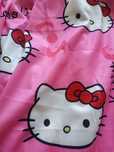 Nowe z metką spodnie piżamowe z nadrukiem all over Hello Kitty S/M
