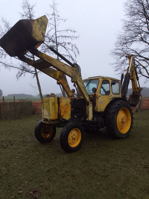 Koparko-ładowarka Białoruś 16000 zł.Ładowacz obornika kleszcz 2000 zł.