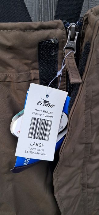 Spodnie wędkarskie ocieplane Nowe Crane na szelkach brązowe rozm. L