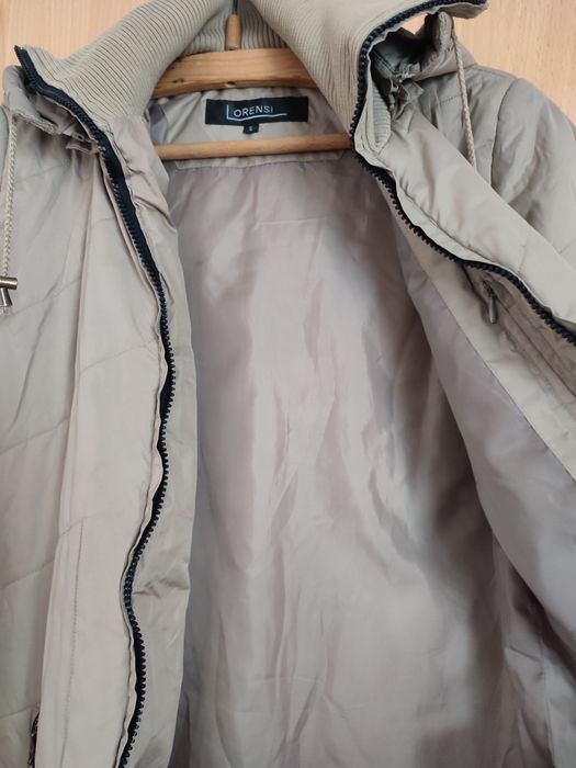 Жіноче пальто бежевого кольору