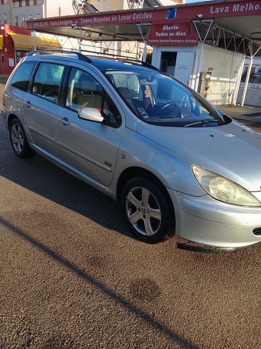 Vendo ou troco Peugeot 7 lugares 04