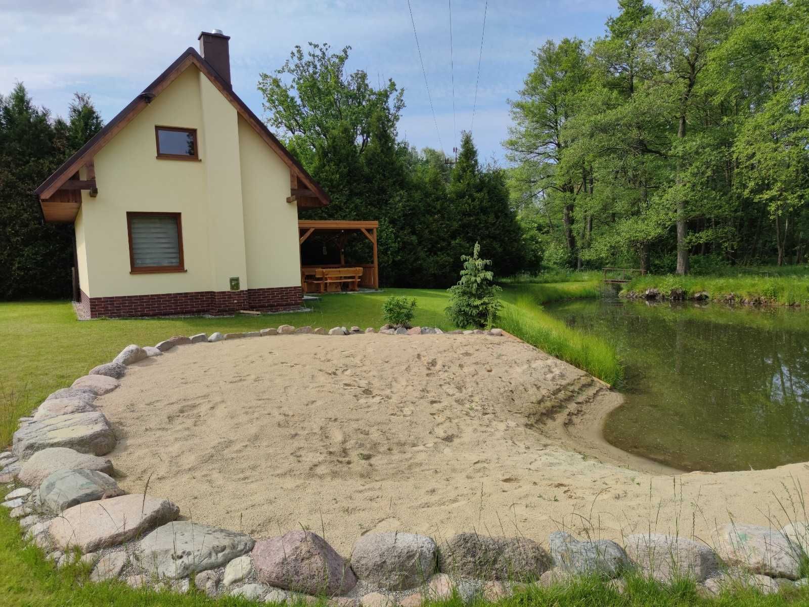 Domek letniskowy nad jeziorem Dominikowo , własny staw i plaża