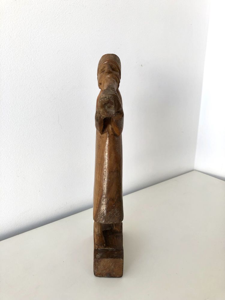 Escultura em madeira - figura com instrumento