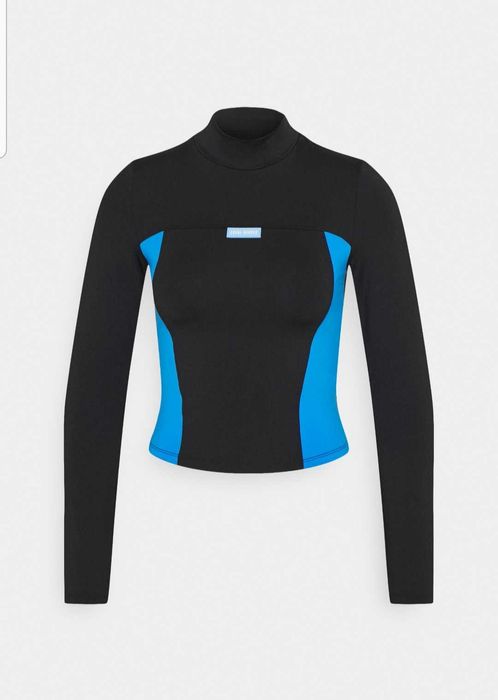 Nowy damski golf bluzka top crop top długi rękaw Local Heroes rozm. L