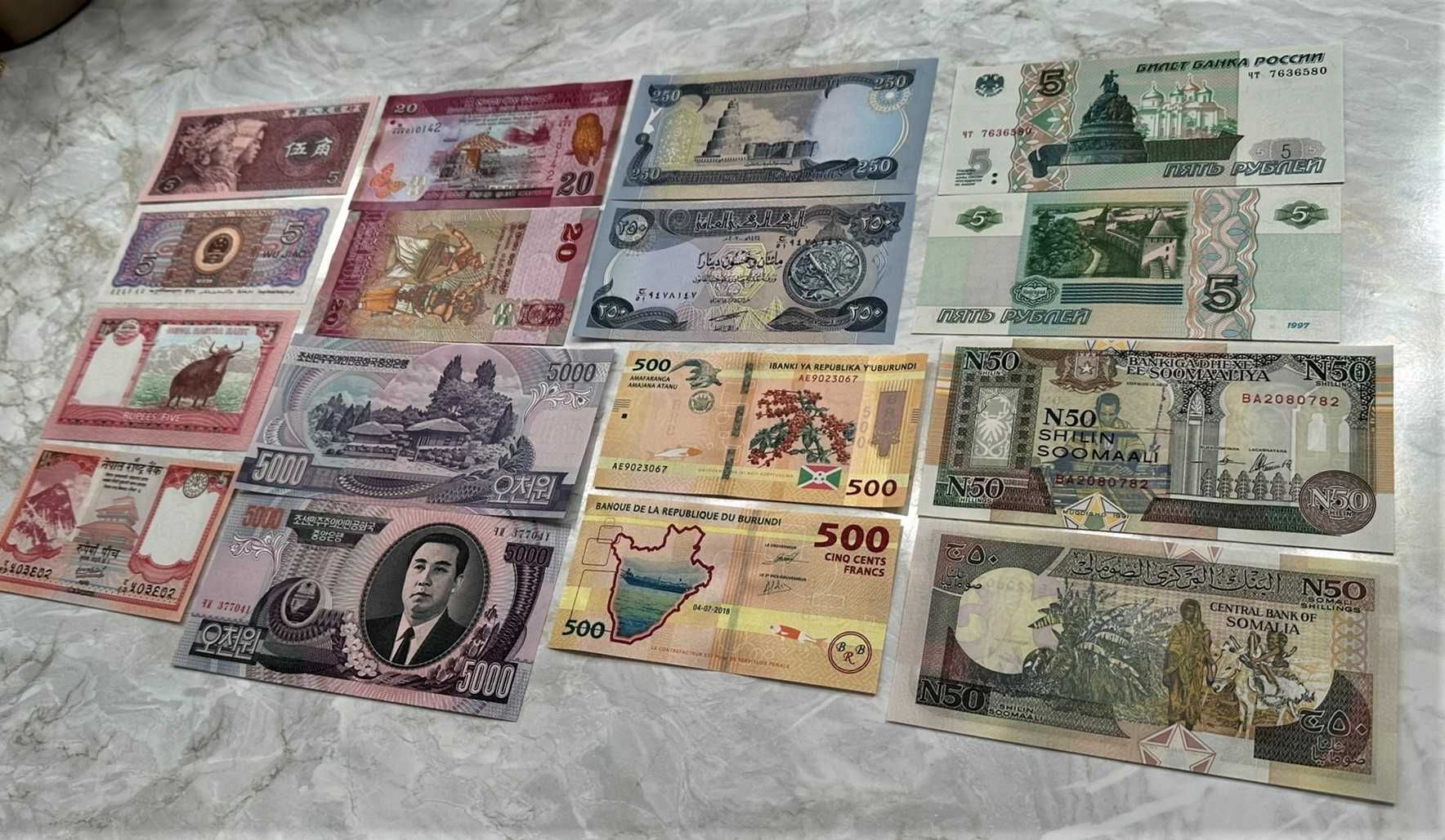 Prezent /Kolekcja -21 kolorowych banknotów z różnych krajów świata.
