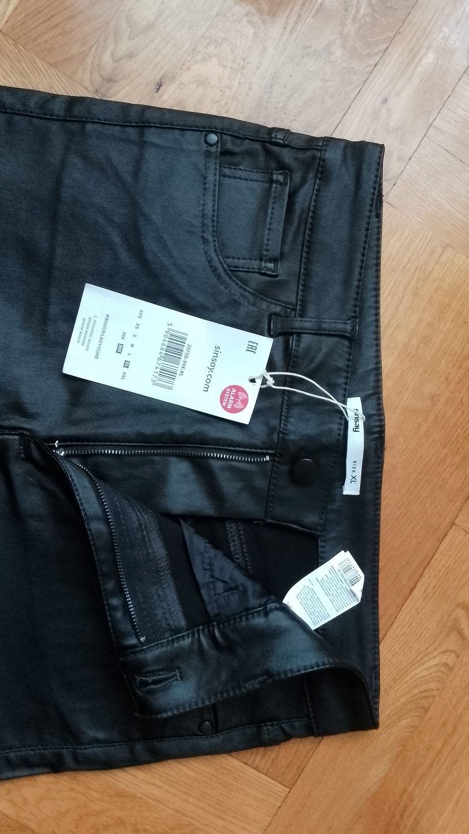 Woskowane czarne spodnie nowe Sinsay rozm XL/L