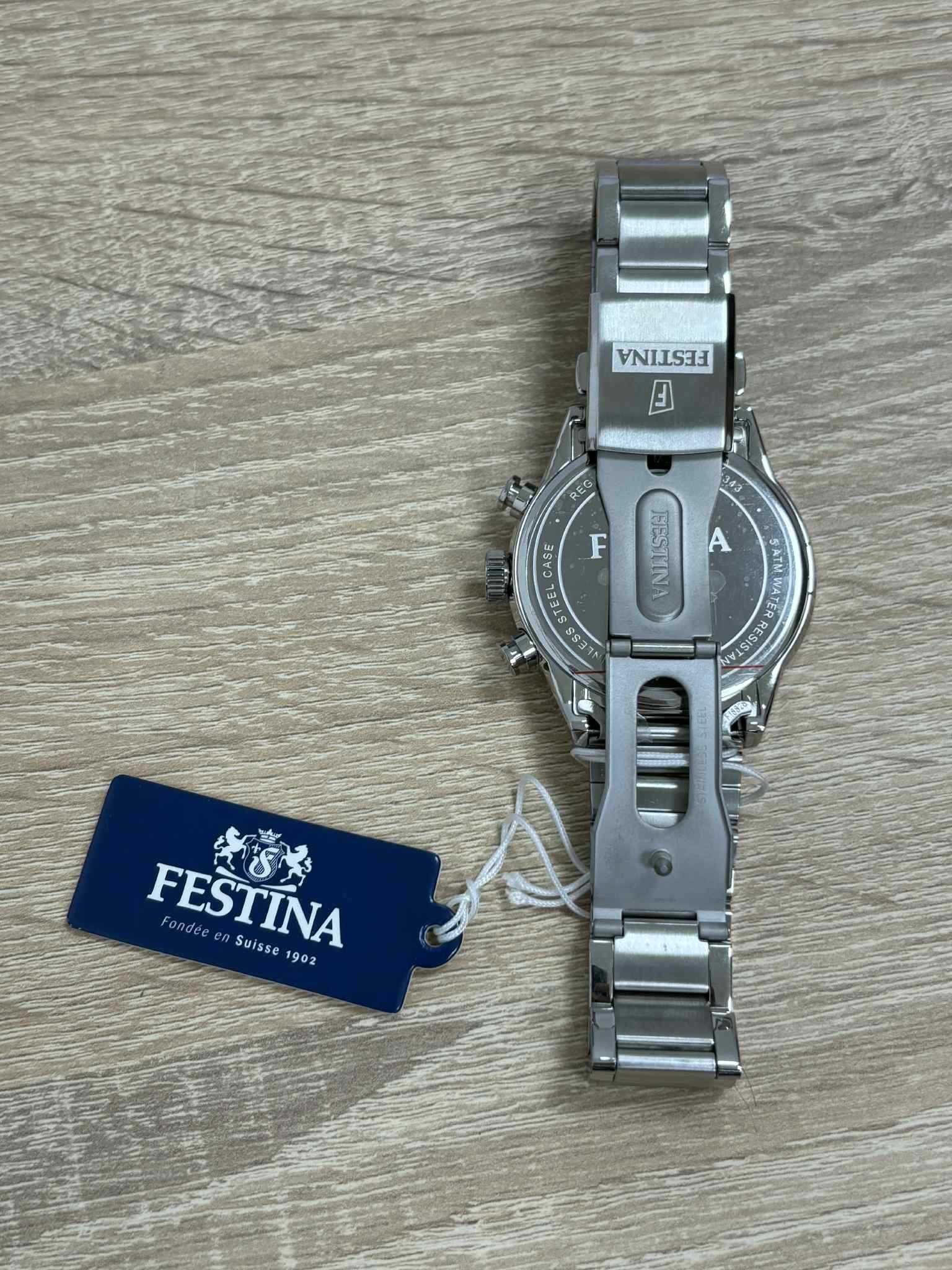 Festina F20343/4 – Czarna tarcza z detalami w złocie. okazja!!