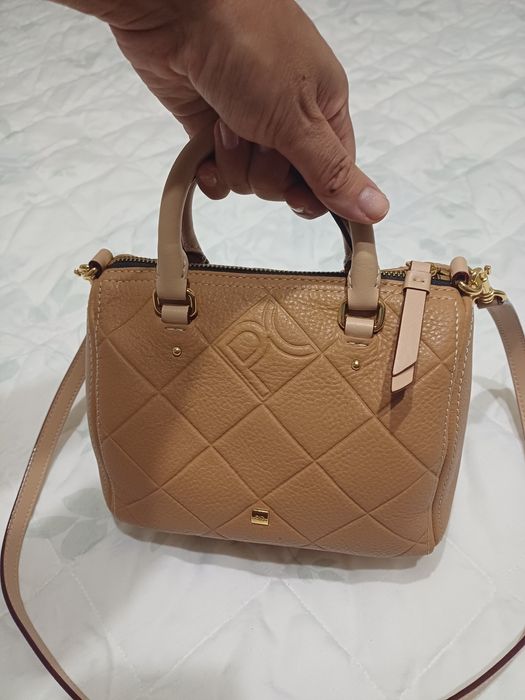 Mala, carteira nova Purificación García