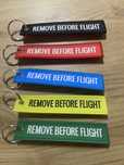 Brelok/zawieszka z napisem remove before flight