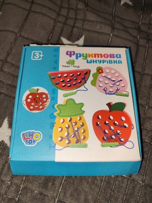 Іграшка шнурівка