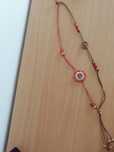 Colar artesanal com flores em renda