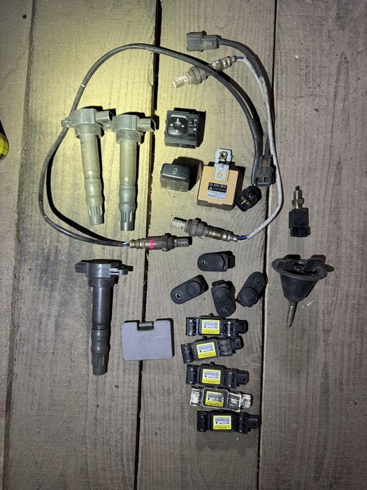 Катушка зажигания грандис 2,4