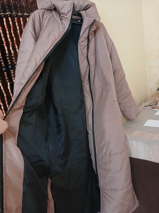 Пуховик новый,размер 46на 48 ,шикарный теплый,согреет в холодные зимни